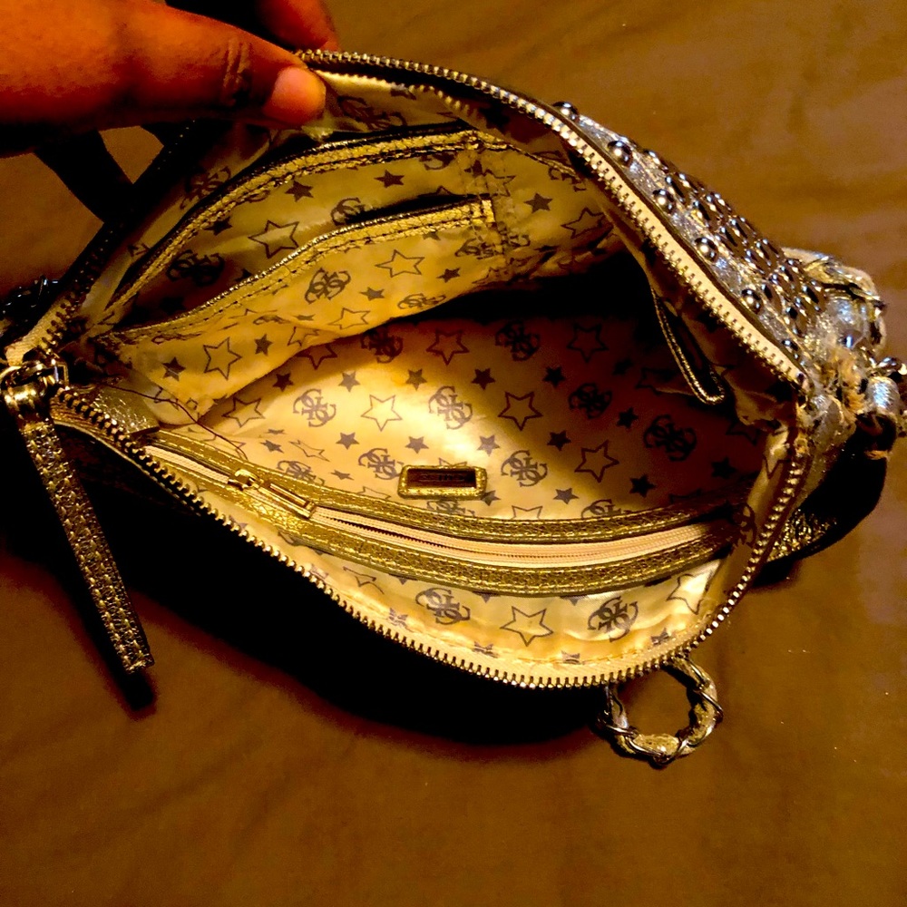 GUESS silver clutch